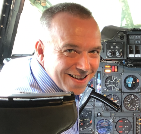 Guy on the flight deck of Concorde G-BBDG